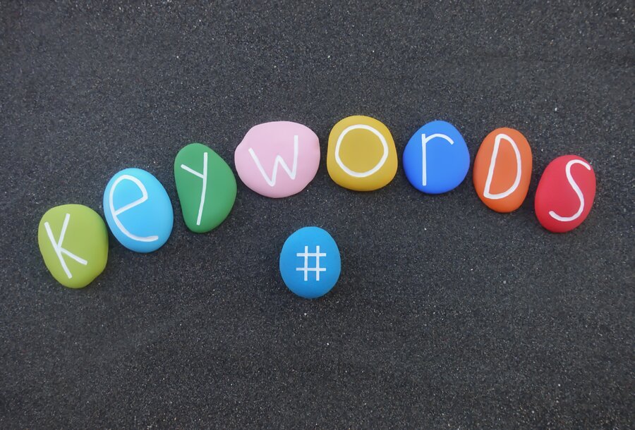 the word keywords, written on tinny pebbles